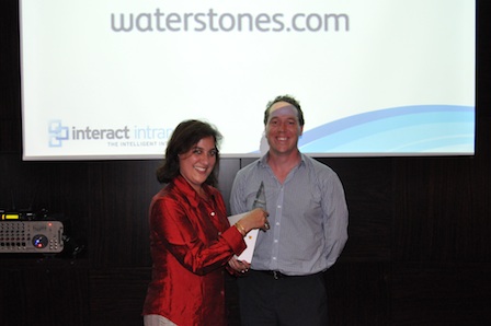 Ayesha Graves collects her award from James Robertson