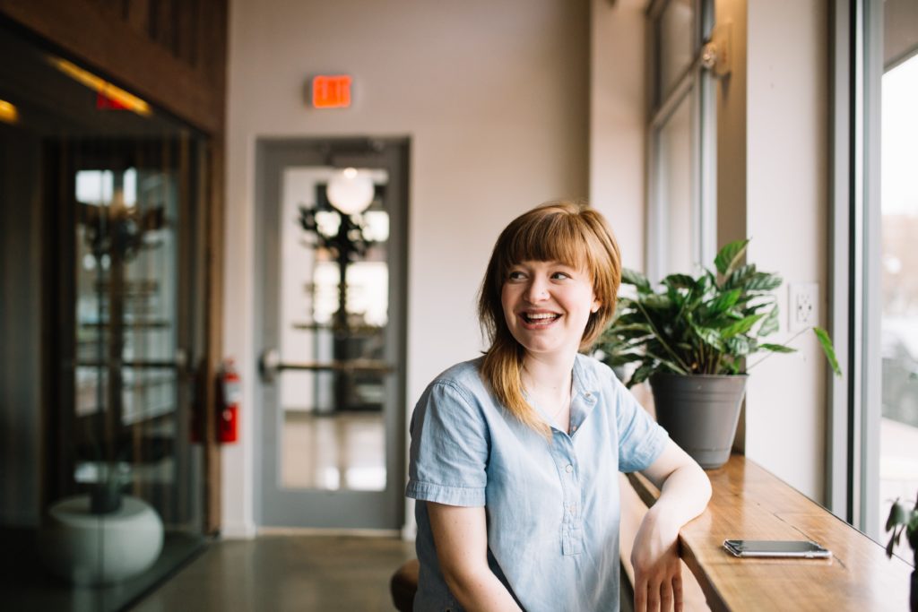 woman smiling off camera