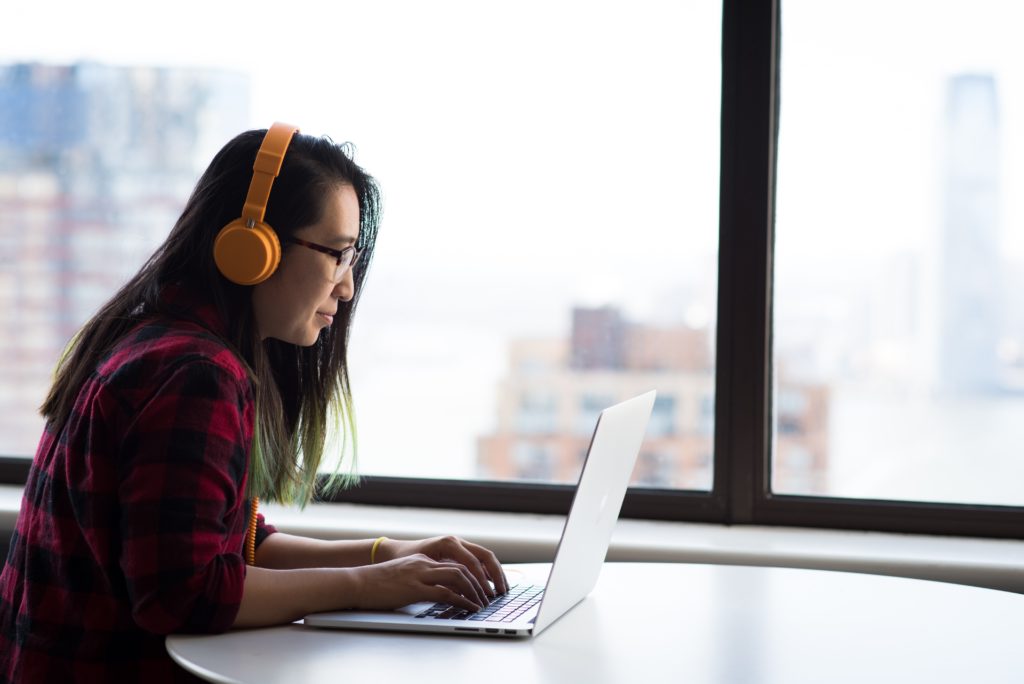 worker listening to headphones