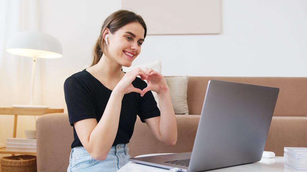 woman communicating on a laptop