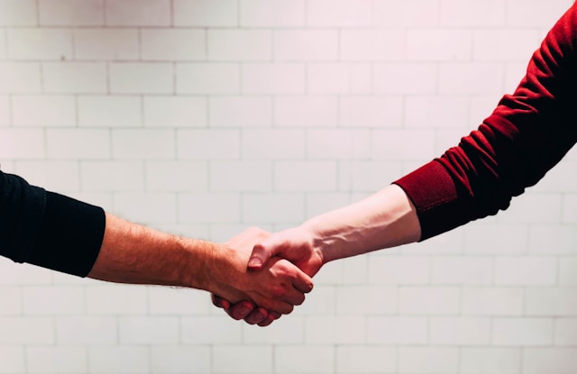 Employee experience vendor partnership handshake