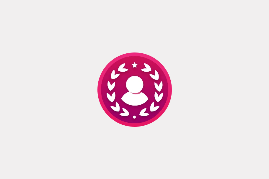 A pink and purple circular achievement badge featuring a person silhouette framed by a laurel wreath and star.