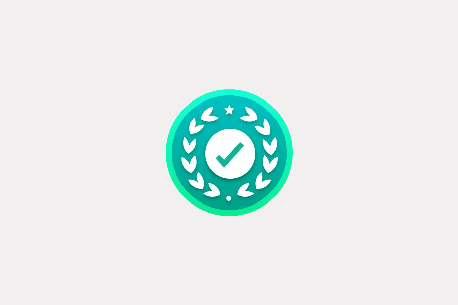 A teal circular achievement badge featuring a checkmark framed by a laurel wreath and star.