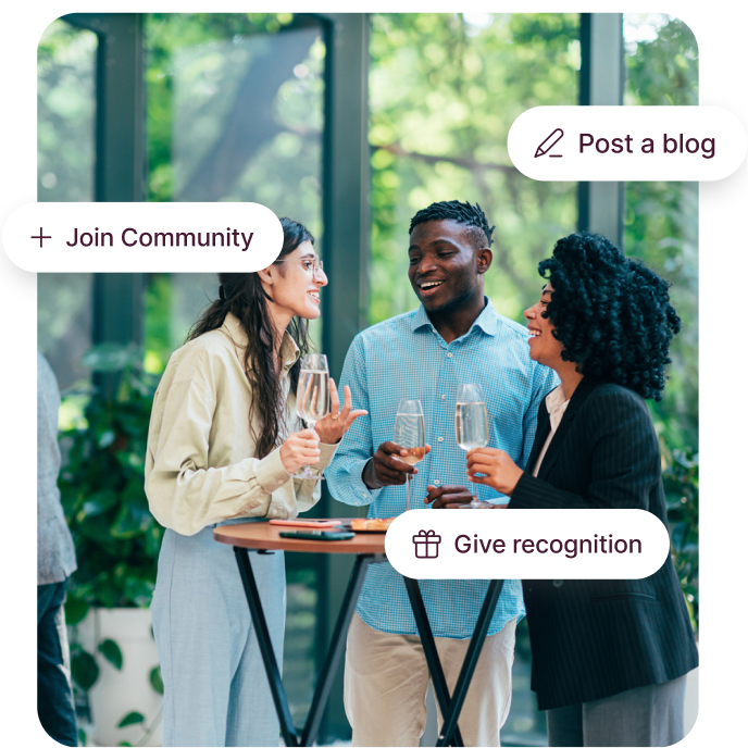 Three colleagues toasting at a social gathering with Interact intranet action overlays showing Join Community, Post a Blog, and Give Recognition, illustrating an intranet strategy services approach to employee engagement.